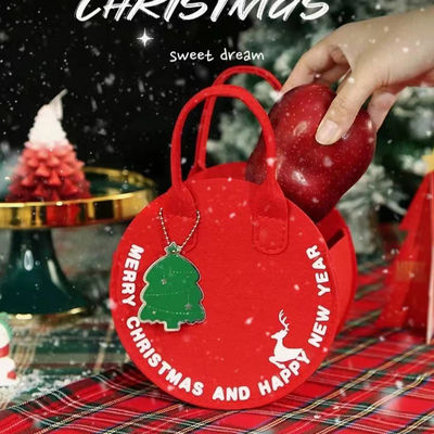 ファッショナブルなクリスマスフェルトバッグ 丸いギフトバッグデザインの赤いサンタクロースショッピングバッグ