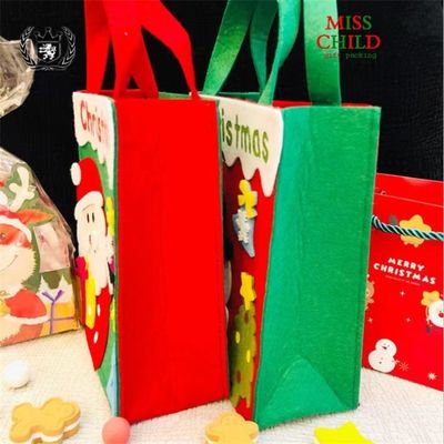 カスタマイズされたカラー クリスマスバッグ ハンドメイドフェルト サンタクロース スノーマン 鹿デザイン