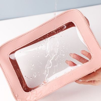 受け入れられるOEM/ODMと固体パターンタイプを持つピンク色の革の化粧袋