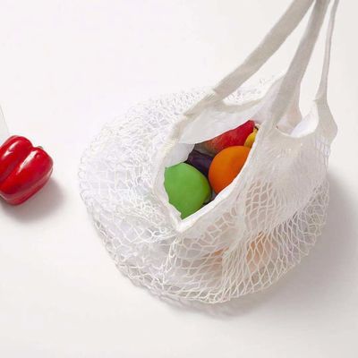 カスタマイズされたロゴ エコ有機綿網網 野菜 果物食品のための再利用可能なショッピングバッグ