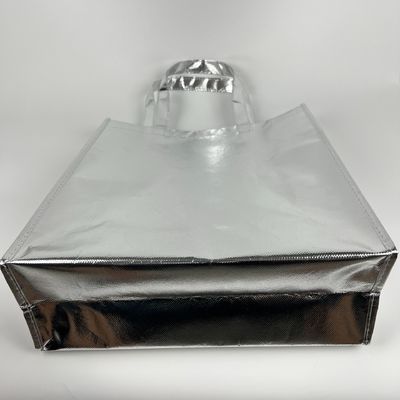 環境に優しいショッピングバッグ 金属ラミネーション 金属シルバー オーダーメイドロゴ付き 織物のないバッグ